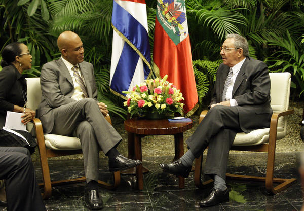 Michel Martelly, presidente de Haití con Raúl